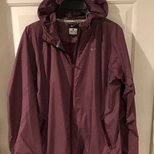 NWOT....Nike Women's Purple Hooded Windbreaker Jacket..